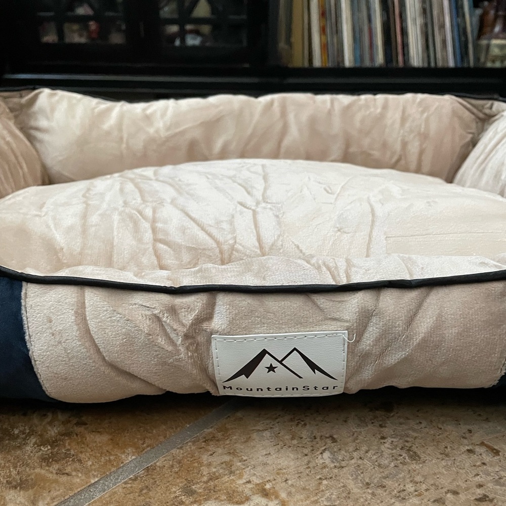 Medium size dog bed with lint brush and washable covering